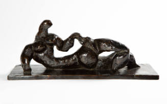 Bronze sculpture of a semi-abstract reclining woman with a long torso on a flat base