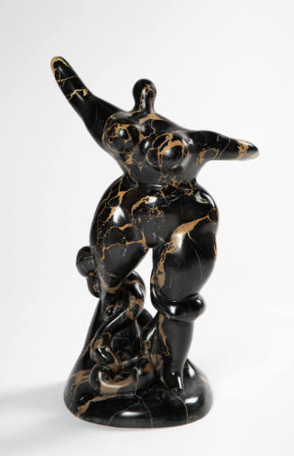 Abstract black marble sculpture of a woman with curved shapes and a snake wrapped around her legs