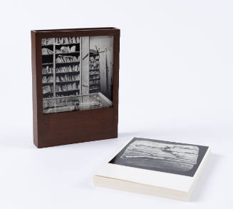 Unbound book of 30 black-and-white photos in teakwood box and wrapped in an embroidered cloth