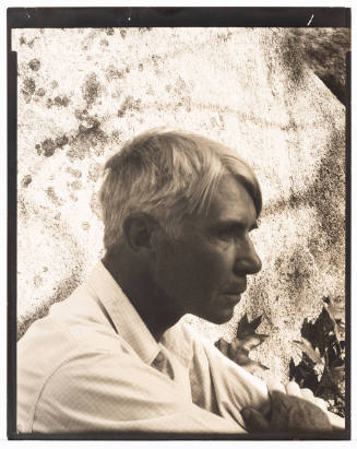 Outdoor profile photo portrait of Carl Sandburg, an older white man with short light hair