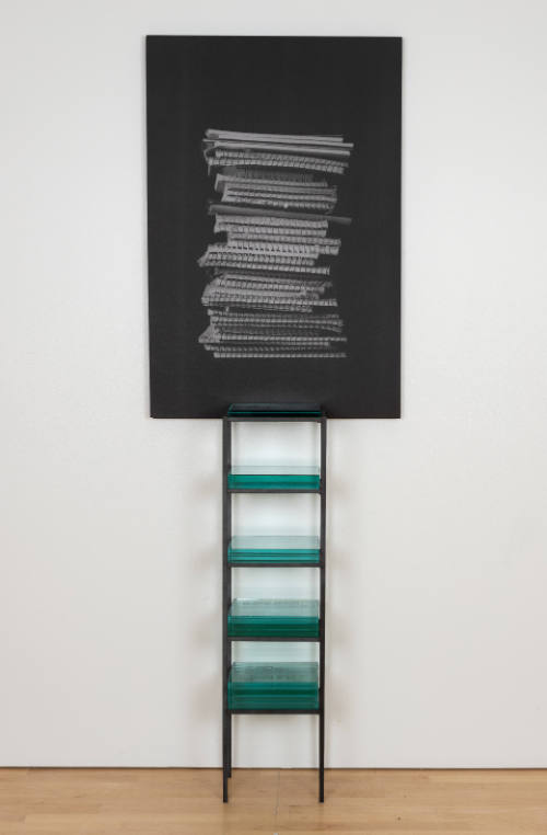 Sculpture of a metal shelf with glass tiles and stretched canvas with an image of stacked notebooks