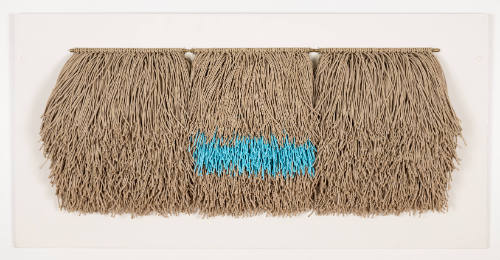 3 sections of layered tan hemp cords slip knotted onto dowel with central section colored sky blue