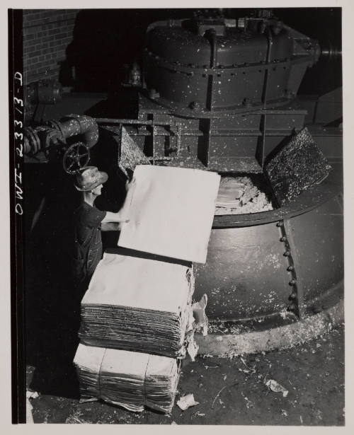 Putting Sheets of Kraft Paper into Vortex Beater Reducing Them to Pulp (from "Southland Paper Mill, Lufkin, TX" series)