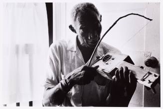 Cigar-box fiddler Scott Dunbar, Mississippi, July 1975