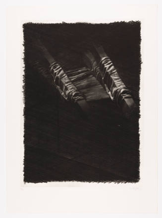 Black-and-white print of shiny fabric laid across boards placed on angle with a black background