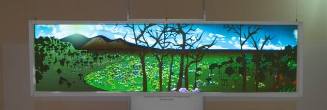 Video installation with animation of landscape with trees, mountains, and blue sky in background